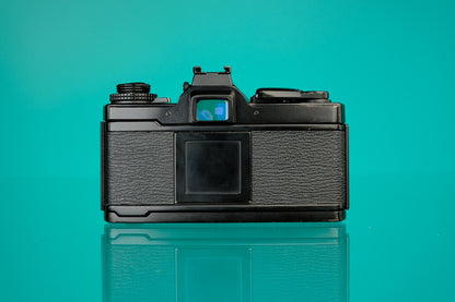 Olympus OM-4T 35mm SLR (Black) + 50mm f/1.8 Zuiko Lens