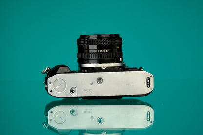 Canon AE-1 Program SLR + 50mm f/1.8 Lens