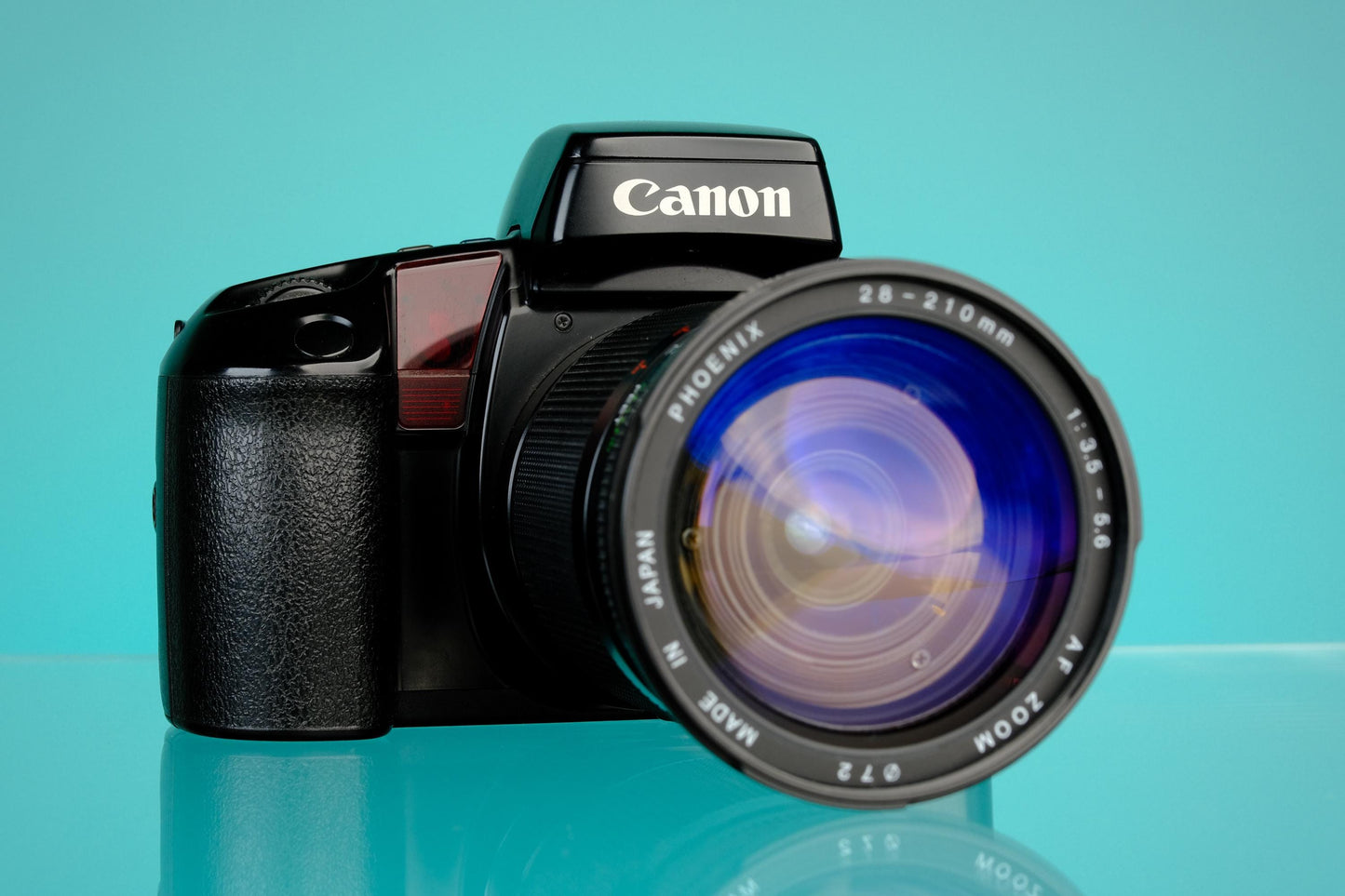 Canon eos ELAN 35mm SLR + 28-210mm f/3.5-5.6 Zoom Lens EF Mount