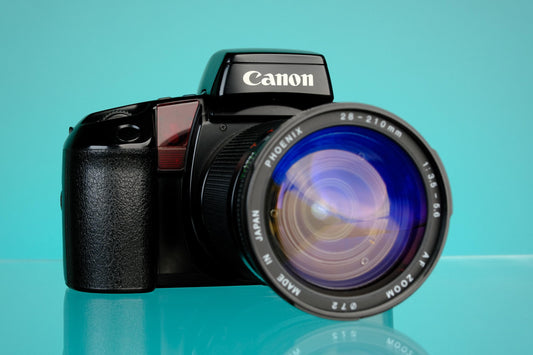 Canon eos ELAN 35mm SLR + 28-210mm f/3.5-5.6 Zoom Lens EF Mount