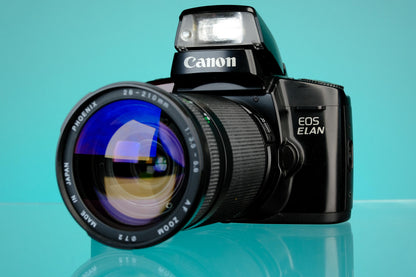 Canon eos ELAN 35mm SLR + 28-210mm f/3.5-5.6 Zoom Lens EF Mount