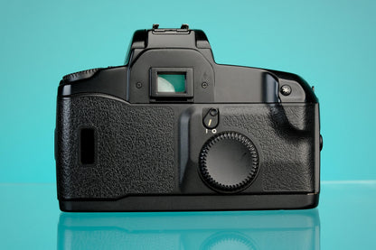 Canon eos ELAN 35mm SLR + 28-210mm f/3.5-5.6 Zoom Lens EF Mount