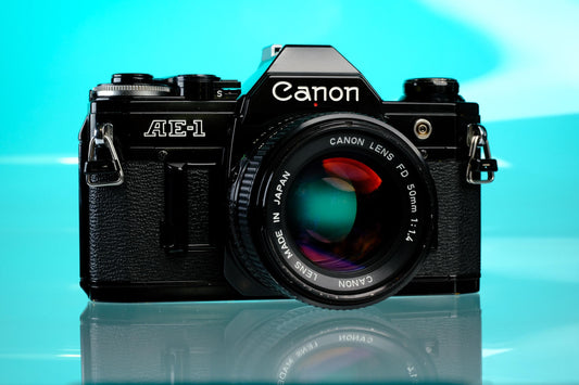 Canon AE-1 35mm SLR Film Camera (Black) + 50mm f/1.4 nFD Lens
