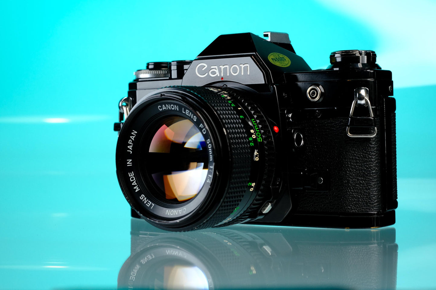 Canon AE-1 35mm SLR Film Camera (Black) + 50mm f/1.4 nFD Lens