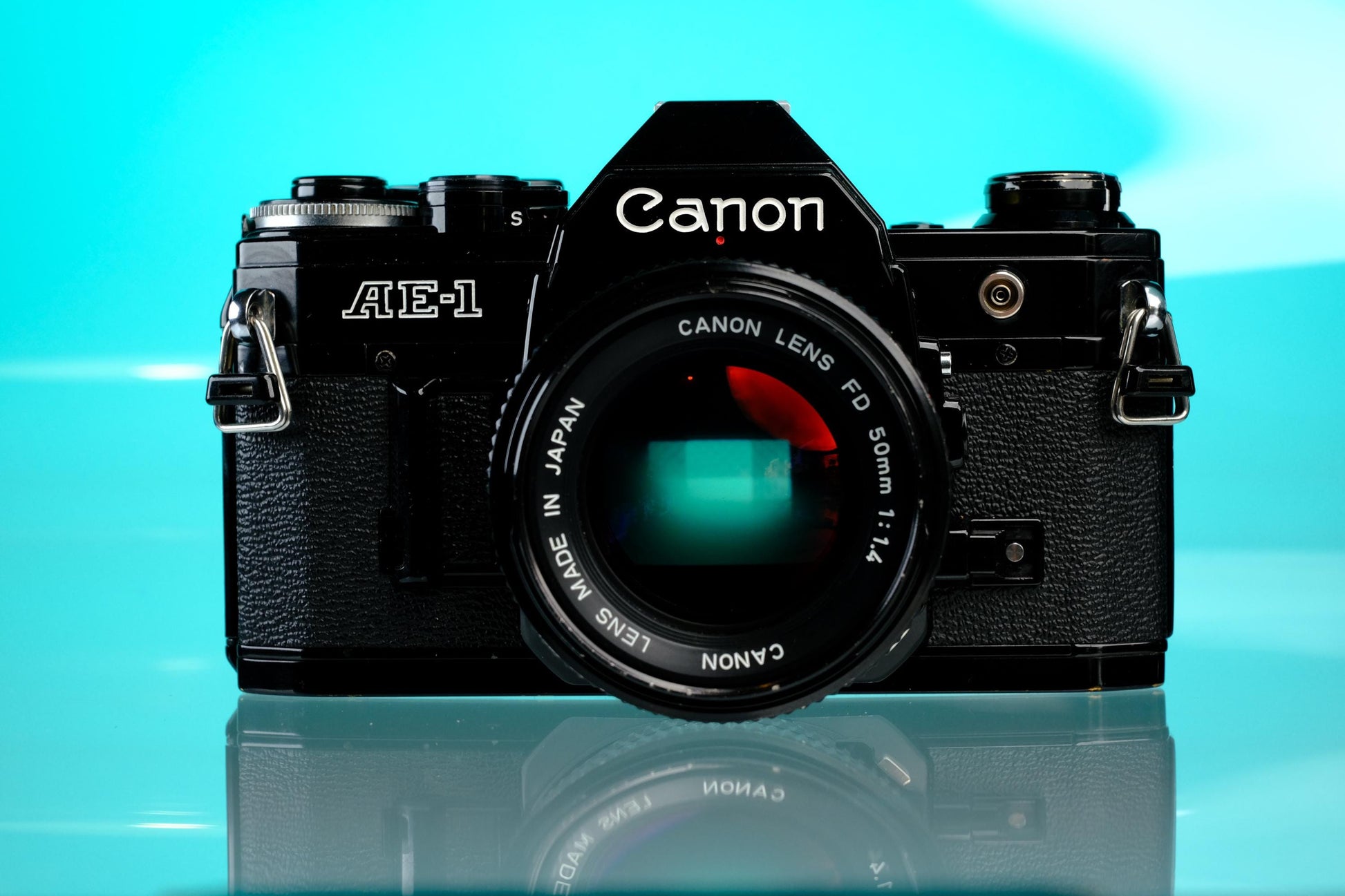 Canon AE-1 35mm SLR Film Camera (Black) + 50mm f/1.4 nFD Lens