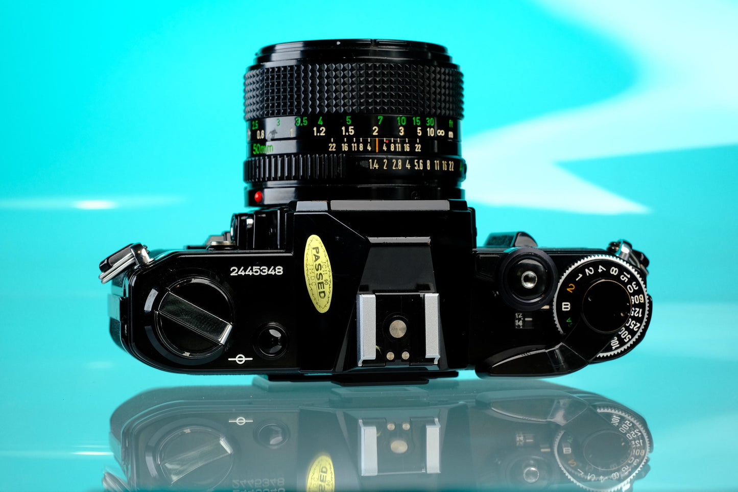 Canon AE-1 35mm SLR Film Camera (Black) + 50mm f/1.4 nFD Lens
