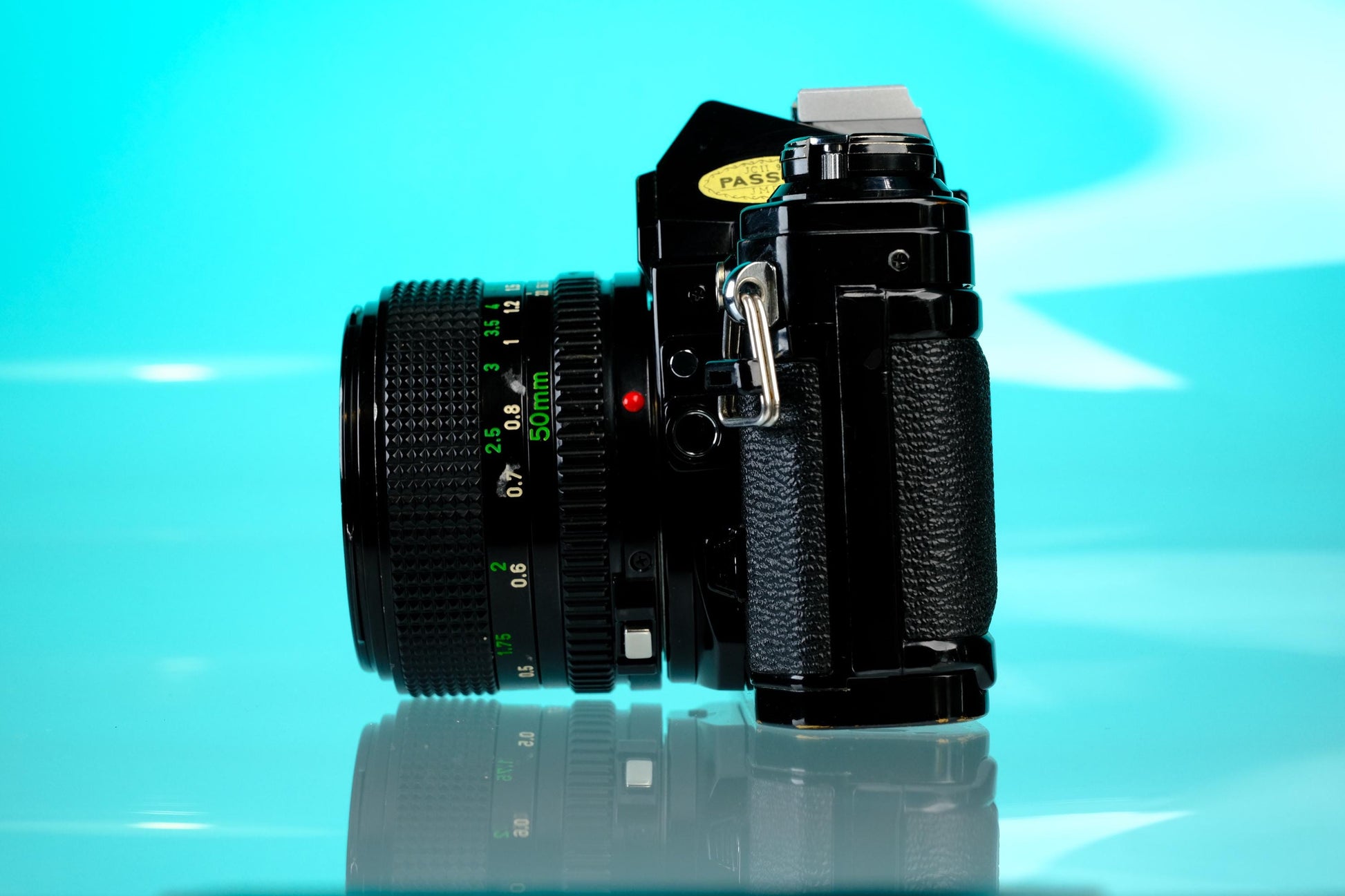 Canon AE-1 35mm SLR Film Camera (Black) + 50mm f/1.4 nFD Lens