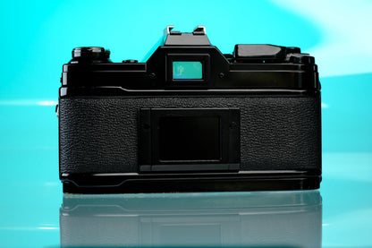 Canon AE-1 35mm SLR Film Camera (Black) + 50mm f/1.4 nFD Lens