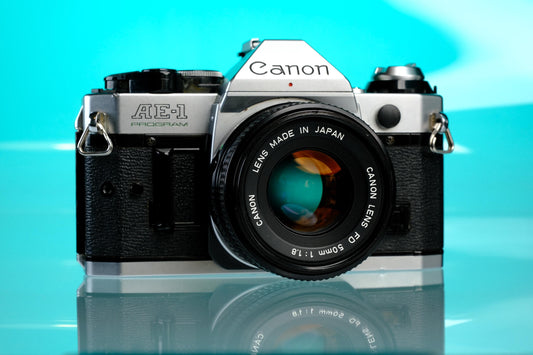 Canon AE-1 Program 35mm SLR Film Camera + 50mm f/1.8 nFD Lens